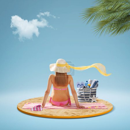 Photo for Beautiful woman sitting on a tropical beach and looking away, back view - Royalty Free Image