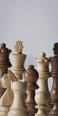 Photo for Assorted wooden chess pieces and blank copy space - Royalty Free Image