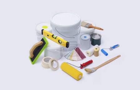 Painting equipment, paint buckets and varnish tins: painting service and home decoration concept