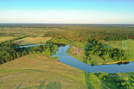 Téléchargez les photos : Aerial view of natural river during morning - en image libre de droit