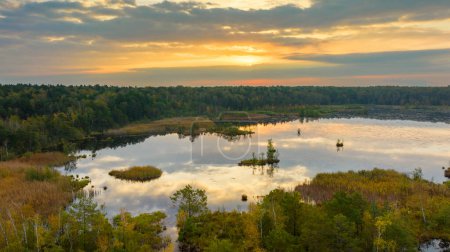 Photo for Beautiful autumn sunrise over the lake - Swiete Lugi, Poland - Royalty Free Image
