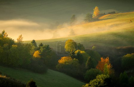 Beautiful foggy morning over the autumn hills