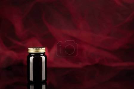Photo for Pill container, nutritional supplements for potency, sexual problems. Mock-up for a medicinal product. - Royalty Free Image