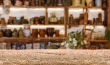 Foto de Mesa de madera con vista a la farmacia borrosa abstracta. Ideal para presentaciones de productos o maquetas. - Imagen libre de derechos