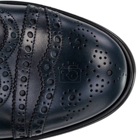 Photo for Close-Up of Brogue Detail on Navy Blue Leather Oxford Shoe - Royalty Free Image