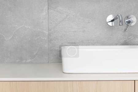 Sleek Modern Bathroom Sink with Wall-Mounted Faucet