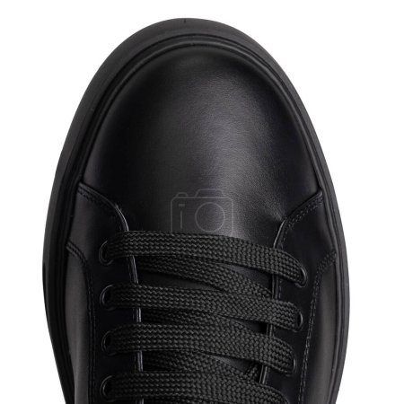 Klassischer schwarzer Sneaker von oben, Cloes-up
