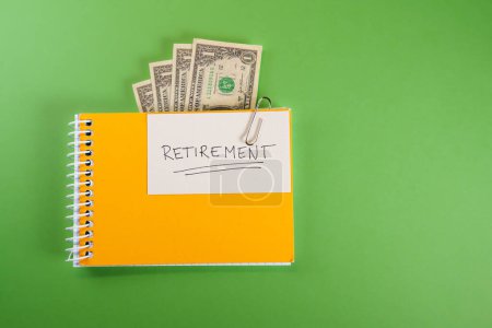 Photo for Retirement plans in a sketchbook. Suitable for concepts as FIRE movement or financial independence retire early, money plan for age senior and financial income pension. - Royalty Free Image