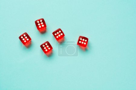 Gaming dice on color background with copy space.