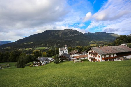 Photo for The picturesque church village Wamberg on impressive mountain landscape, near Garmisch Partenkirchen, Germany - Royalty Free Image