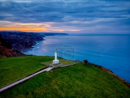 The lighthouse of Lastres  at sunset located in the town of Luces, Asturias, Spain.
