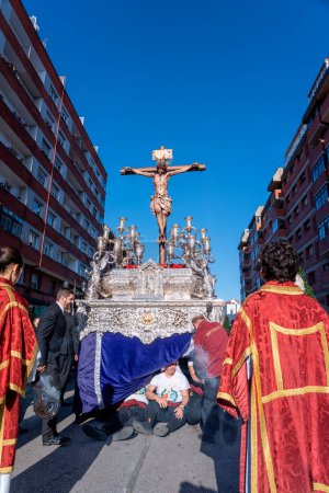 Photo for Oviedo, Spain - March 24, 2024: Holy Week Procession in Oviedo, Brotherhood of Students, Asturias. Spain. Costalero resting - Royalty Free Image