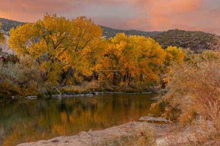 Photo for Rio Grande flowing through Embudo, Rio Arriba County, New Mexico in fall sunset - Royalty Free Image