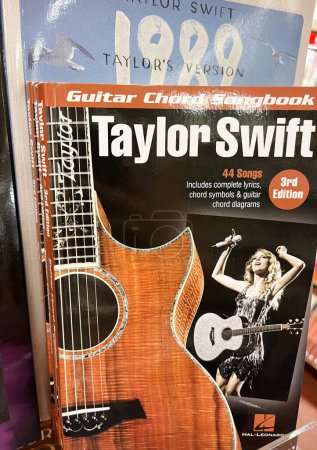 Photo for Sydney, Australia - March 05, 2024: Taylor Swift guitar chord Songbook and 1989 Taylor's Version books presented for sale in the bookstore. - Royalty Free Image