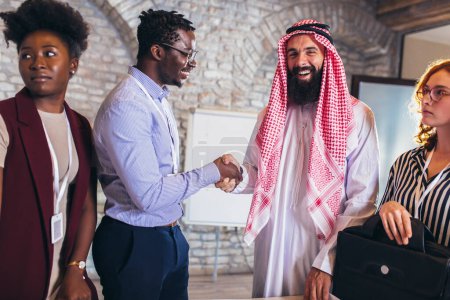 Photo for Multicultural business people meeting and talking about business. Arab business people in a meeting - Royalty Free Image