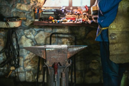 Photo for Dark smithy with blacksmith tools - Royalty Free Image