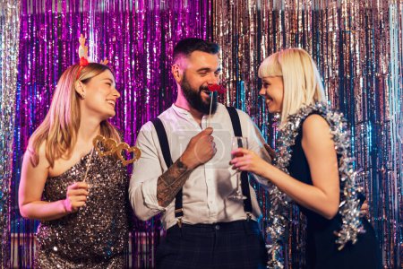 Photo for New year party celebration with friends in the club - Royalty Free Image