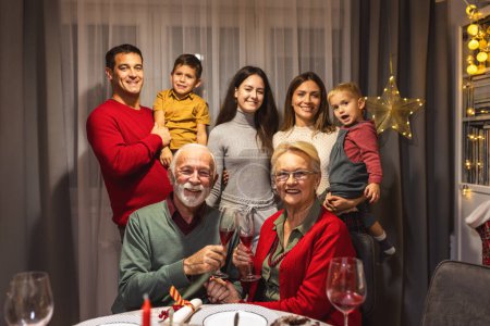 Photo for Happy family portrait on Christmas Eve. - Royalty Free Image