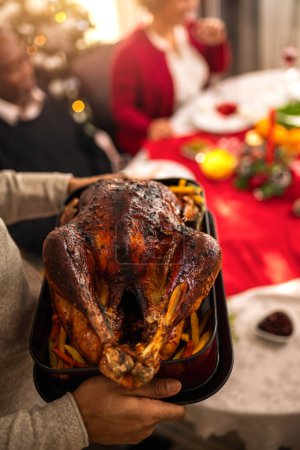 Photo for Turkey is being served on the dining table on Christmas Eve. - Royalty Free Image