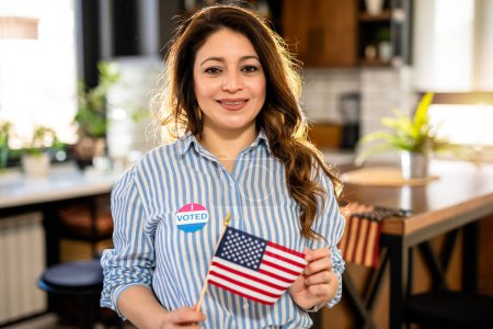Photo for Latino woman voted in the American elections. - Royalty Free Image