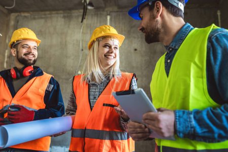 Photo for Construction team planning a building blueprint project on site with collaboration for architect innovation. Architecture, design and engineers with teamwork for successful industrial renovation. - Royalty Free Image