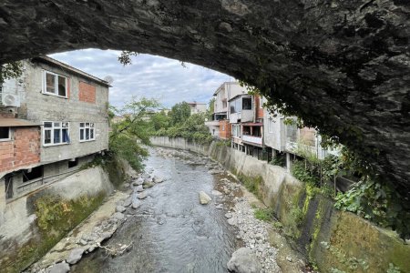 Building and river in Kemalpasha town near Sarp, Turkey