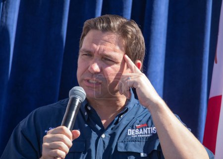 Photo for Des Moines, Iowa, USA - August 12, 2023: Florida Republican Governor and presidential candidate Ron DeSantis greets supporters at the Iowa State Fair fair side chats in Des Moines, Iowa. - Royalty Free Image