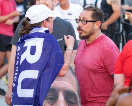 Photo for Milwaukee, Wisconsin, USA - August 23, 2023: Supporters of former President Donald Trump argue with counter-protesters at the first 2024 Republican Presidential Debate. - Royalty Free Image