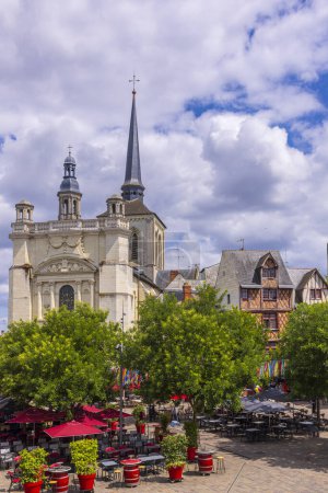 Town of Saumur, France, located at the Loire river under a beautiful cloudscape during daytime.