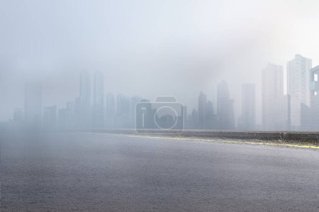 Photo for Asphalt road with modern building and skyscrapers on the midtown - Royalty Free Image