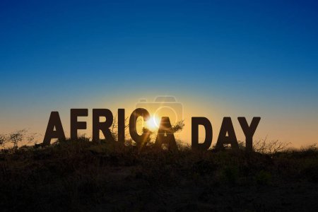 Foto de Texto del día de África en el campo con el fondo de la escena del amanecer. África concepto de día - Imagen libre de derechos