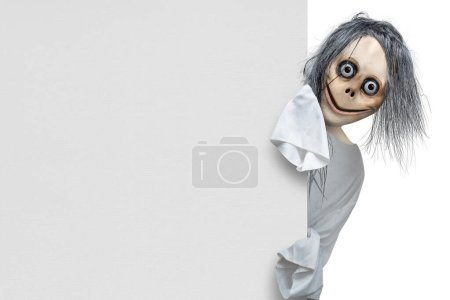 Scary Momo standing behind the wall on white background. Scary face for Halloween decoration