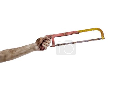Photo for The hand of a scary zombie with blood and wounds carrying a saw is isolated over a white background - Royalty Free Image