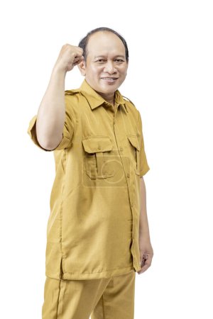 Photo for Civil servant man standing with hand gesture isolated over a white background. Pegawai Negeri Sipil (PNS) - Royalty Free Image