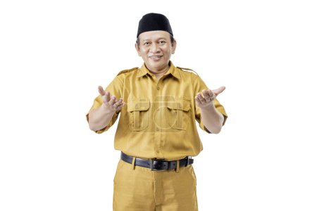 Photo for Civil servant man standing with empty palm isolated over a white background. Pegawai Negeri Sipil (PNS) - Royalty Free Image