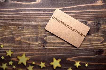 Photo for Greeting card with Congratulations text on wooden table. Congratulation concept - Royalty Free Image