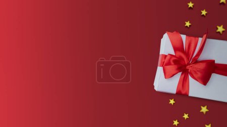 Photo for Gift box with a copy space area on a colored background. Congratulation concept - Royalty Free Image
