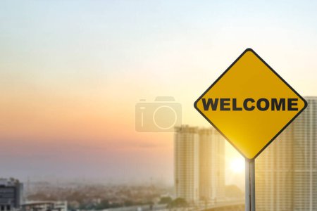 Photo for Yellow sign pole with welcome text on the city. Introduction concept - Royalty Free Image