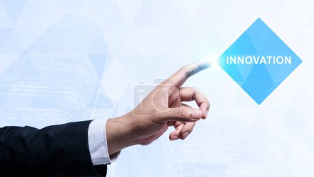 Foto de Business hands touch an innovation text. New ideas with innovative creativity. Innovation concept - Imagen libre de derechos