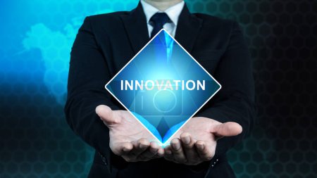Foto de Business hand showing innovation text. New ideas with innovative creativity. Innovation concept - Imagen libre de derechos
