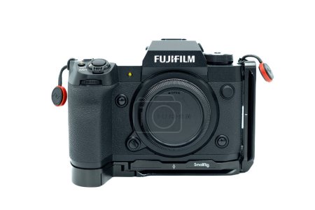 Photo for Irvine, Scotland, UK - October  26, 2023: Fujifilm branded X-H2 Camera is now Equipped with a new 40.2 megapixel APSC sensor and is shown here with the Smallrig branded L bracket and Peak Design strap connectors - Royalty Free Image
