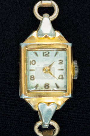 Vintage gold-tone  Manual Wind up lady wrist watch with gold numerals, The watch face is worn, and thought to be about early 1900s.