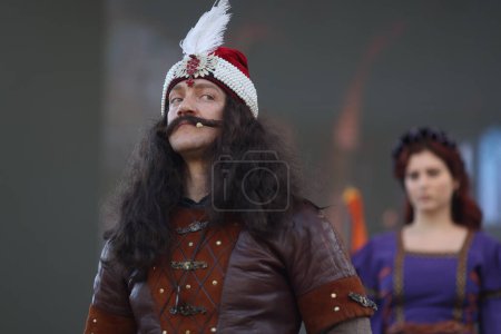 Photo for Targoviste, Romania - April 7, 2024: An actor impersonating Vlad Tepes (Dracula) during a performance. - Royalty Free Image