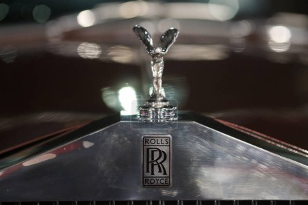Photo for Bucharest, Romania - April 21, 2024: Details with the front part and emblem of a retro Rolls Royce vintage luxury car. - Royalty Free Image