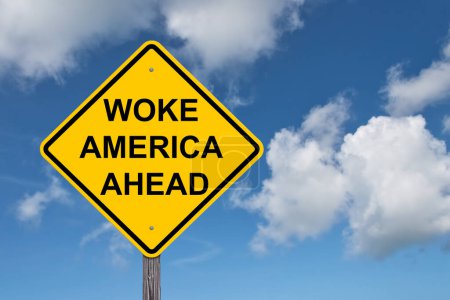 Photo for Woke America Ahead Caution Sign - Blue Sky Background - Royalty Free Image