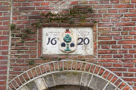 Photo for Delft, the Netherlands. 17th century sign on the old building. - Royalty Free Image