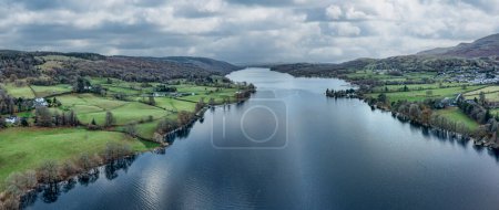 Photo for Aerial panorama of coniston water and coniston village looking south - Royalty Free Image