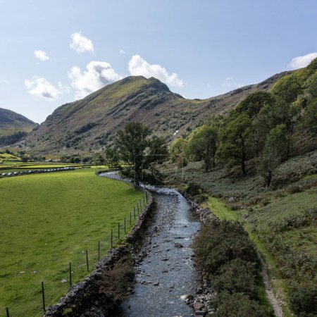 Photo for River derwent in the seathwaite valley borrowdale lake district looking south towards base brown - Royalty Free Image