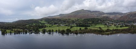 Photo for Elevated panorama of Coniston Water in the Lake District with the Old Man of Coniston in the background - Royalty Free Image