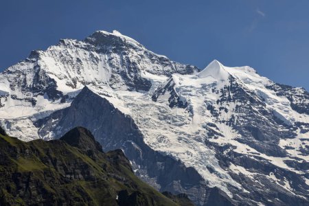 Photo for The summit of the jungfrau and the silberhorn above wengen switzerland - Royalty Free Image